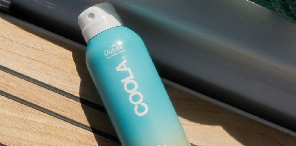 COOLA spray sunscreen bottle